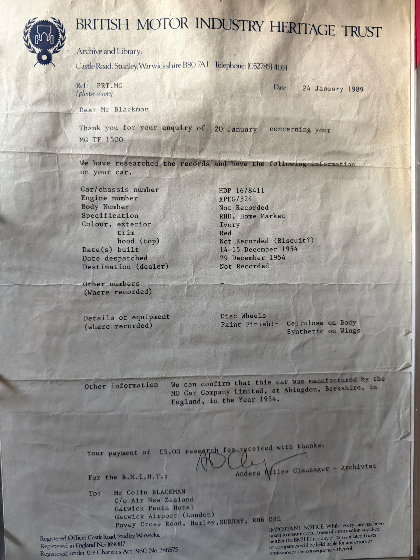 British Motor Industry Heritage Trust certificate for WSU 141, confirming its 1954 Abingdon build, Ivory-over-red colours and matching numbers. Personal details redacted.