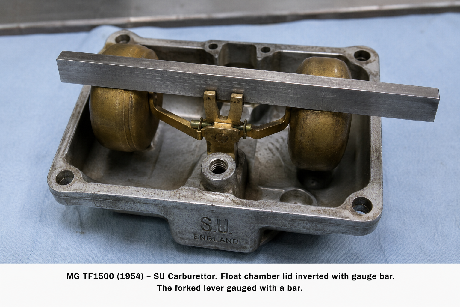 MG TF1500 (1954) — SU Carburettor float chamber lid inverted with gauge bar