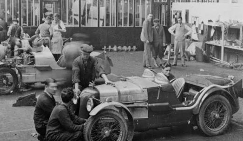 MG workers around a T-Type body at the Abingdon works.