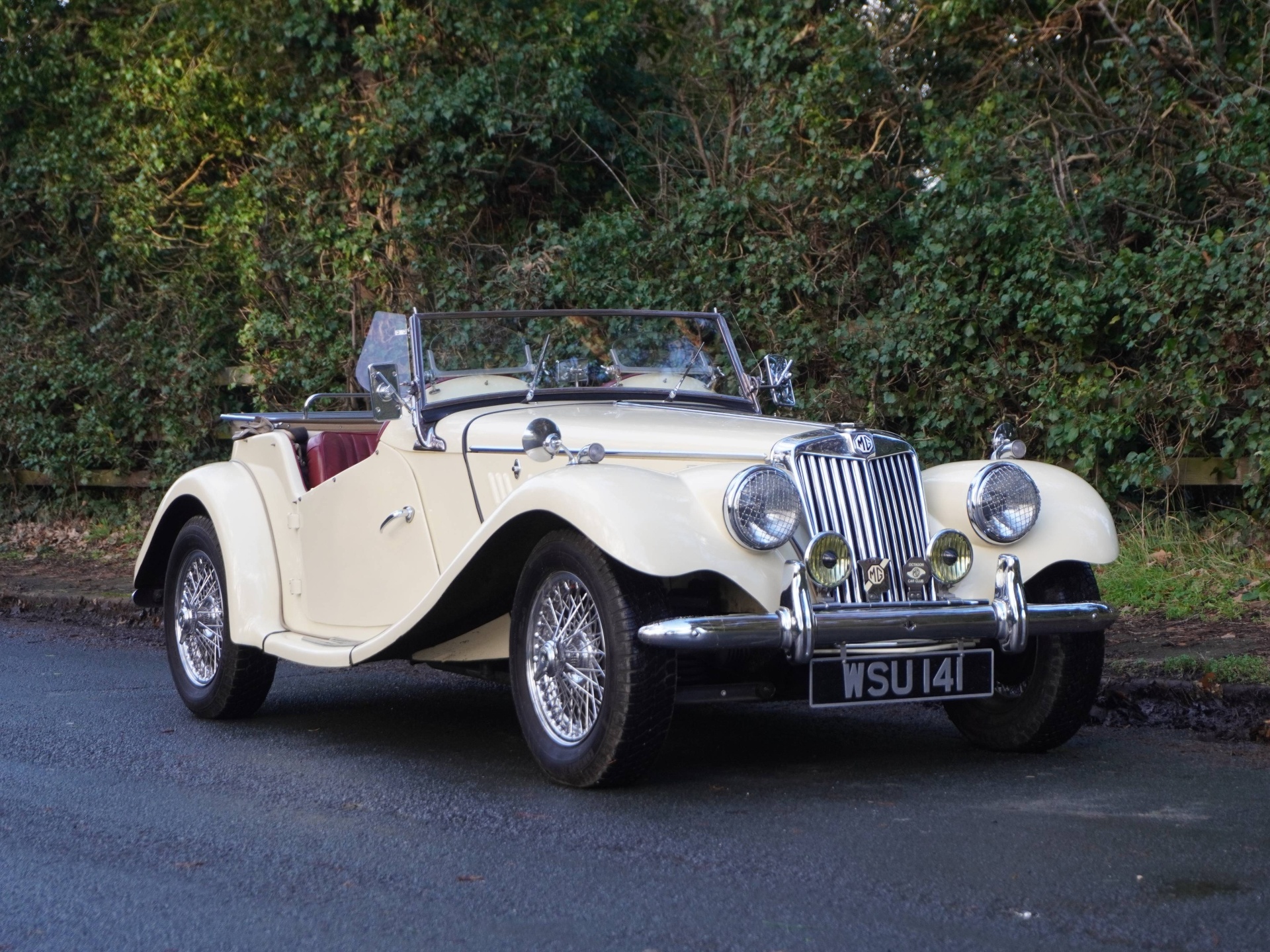 WSU 141, a 1954 MG TF 1500 in Ivory over red