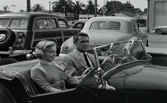 Cary Grant and Marilyn Monroe in an MG TD in Monkey Business (1952).