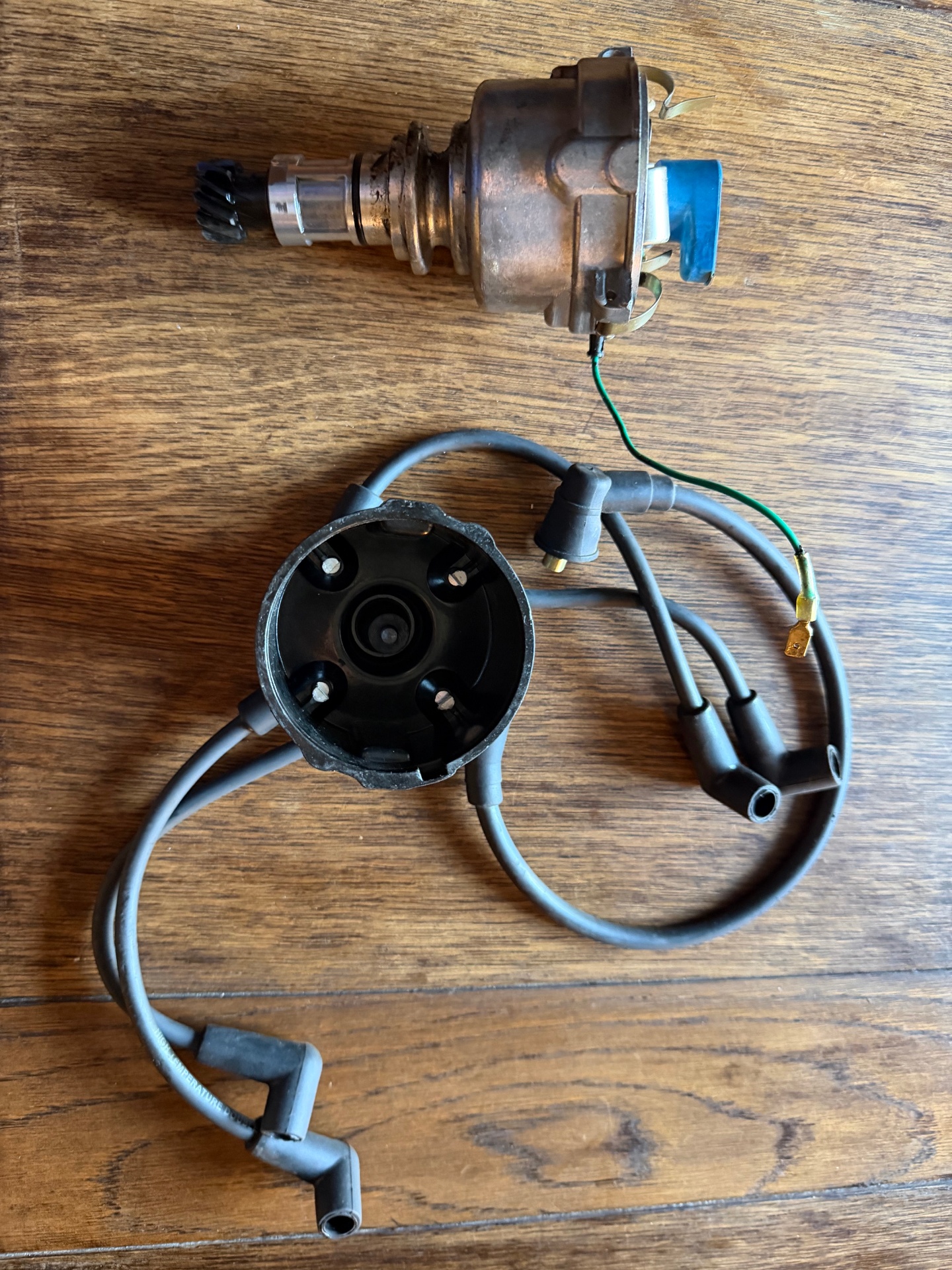 The cheap reproduction distributor as removed from the car. Photographs of your car, never stock imagery.